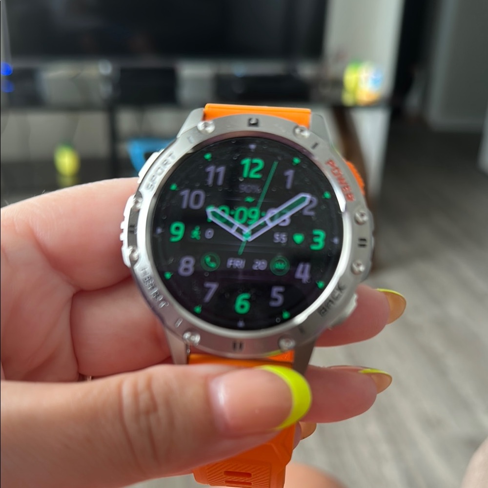 Sleek Orange and Silver Smartwatch with Modern Display